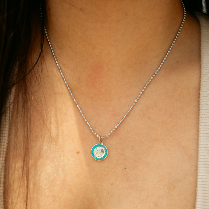 small silver baby blue on model neck 
